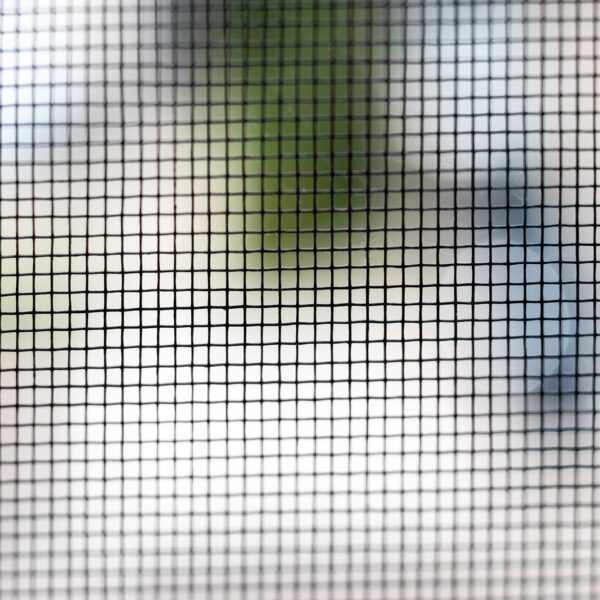 Mosquito net on the window closeup. Protection of the house from small insects